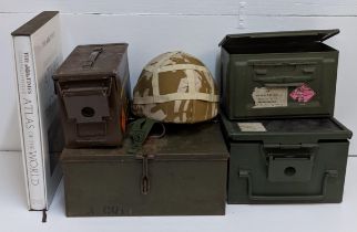 Five ammunition boxes, a Times Atlas, and a 1980s Army helmet Location: