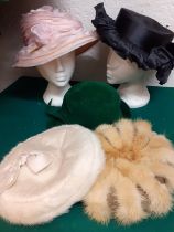 A quantity of vintage hats to include 2 Philip Somerville formal hats, a mid 20th Century Chez