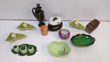 A collection of Carlton ware to include candlesticks, sauce tureens, condiments and other items