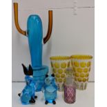 A Conran blue glass vase (signed), two yellow decoratively designed drinking glass, a pink glass