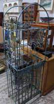 A selection of garden and conservatory items to include a painted wirework wine rack and stand,