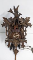 A mid 20th century German black forest carved cuckoo clock