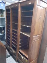 A large breakfront 3 tambour door stationary cabinet with internal shelves, 148cm wide x 46cm deep x