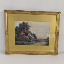 J Mander - an Edwardian watercolour depicting a figure by a cottage, 34cm x 24cm framed Location: