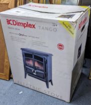 A boxed Dimplex Tango electric stove heater Location: