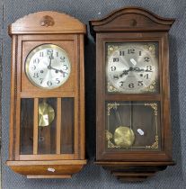 Two wall clocks to include an early 20th century oak 8-day clock Location: