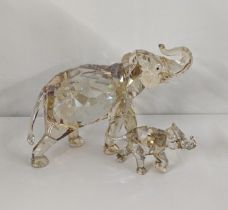 A Swarovski crystal society 'Cinta; the Asian elephant, together with a elephant cub Location: