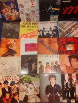 A quantity of mainly late 1970's and 1980's LPs and 12" records to include Rod Stewart, Blondie, The