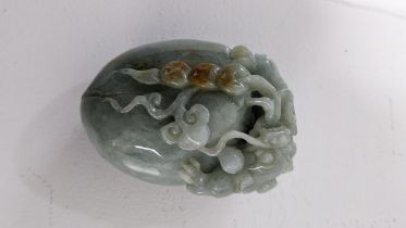 A 20th century carved jade stone, carved with a dragon Location: