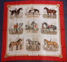 Hermes-A silk 'Les Robes' scarf designed by Ledoux having a deep red border surrounding images of