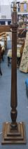 A Victorian mahogany 'bedpost' standard lamp having a reeded column and a stepped base Location: