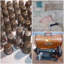 A Victorian Singer sewing machine serial No:9681560 together with a quantity of 1960's and 1970's