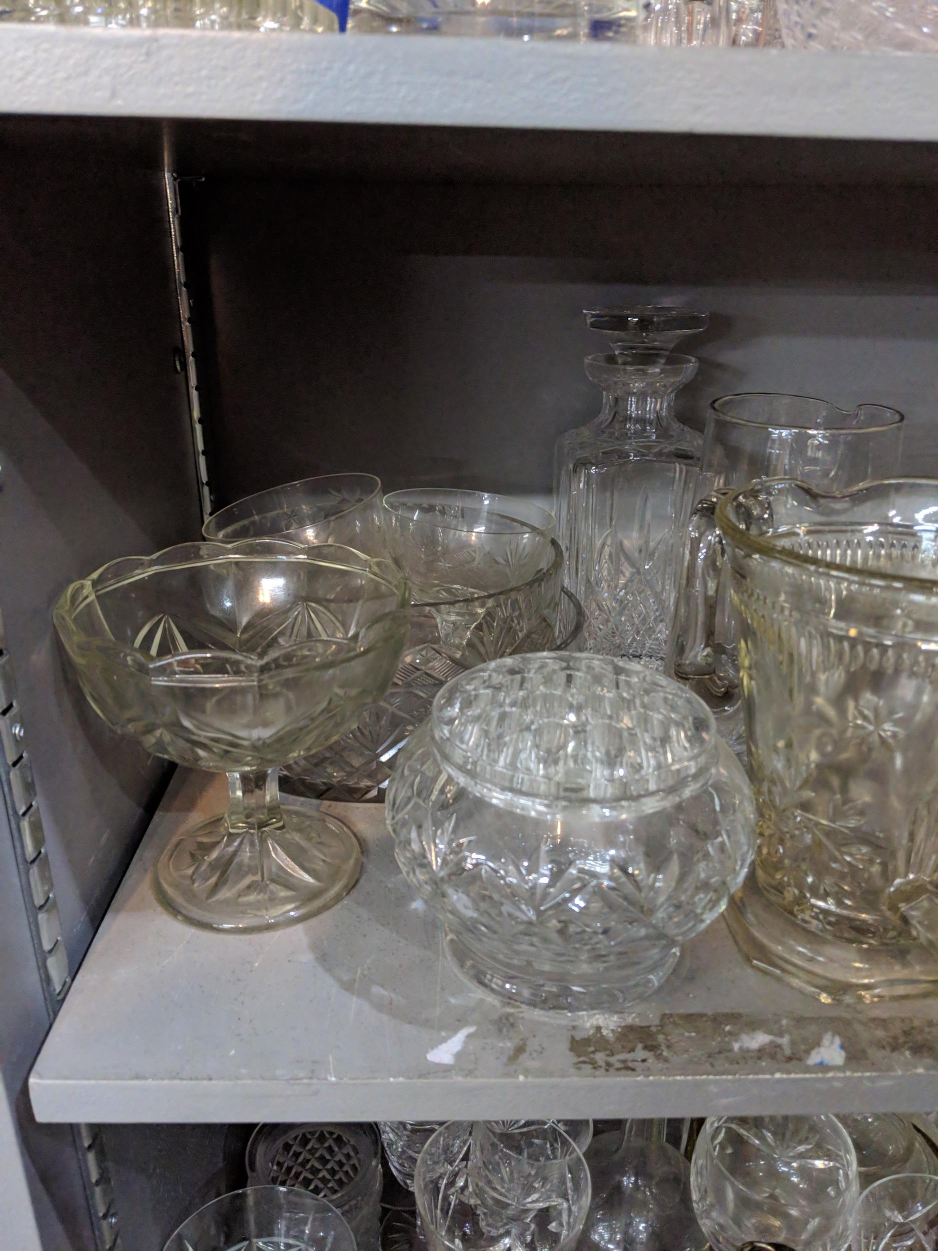 A large quantity of glassware to include domestic glasses, bowls, decanters and other items - Image 9 of 9