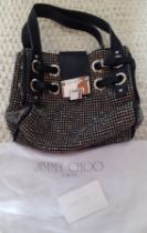 Jimmy Choo-A Ramona tote bag encased with grey crystals on a black ground with silver tone