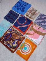 A quantity of mainly silk vintage scarves to include an Ostinelli scarf in navy, red and white and