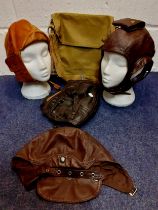 Four vintage soft leather flying helmets to include Cirrus examples and an army canvas bag.