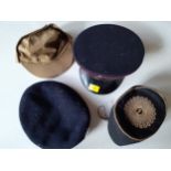 A group of 4 hats to include a navy felt Royal Regiment of Wales cap size 6⅞, a brown USSR army