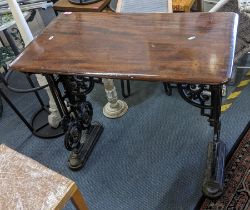 A Victorian cast iron pub table with a mahogany rectangular top and painted base 79hx86w Location: