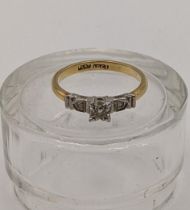 An 18ct gold ring with diamonds 3.7g Location: