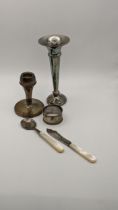 Mixed silver to include a Mother of Pearl and silver knife and spoon, a napkin ring, vase and