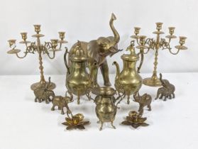 Mixed brassware to include a brass elephant sculpture together with a pair of candelabras and others