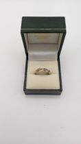 A 9ct gold diamond twisted pave ring 1.8g Location: