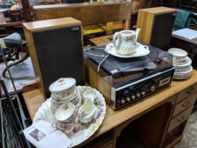 A vintage National Panasonic compact stereo system with teak housed speakers and manual, along with