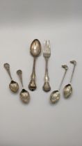 Mixed cutlery to include a pair of silver teaspoons having terminals fashioned as a dog's head and
