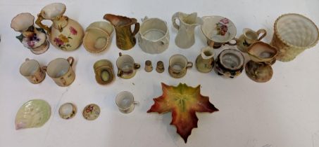 A collection of Royal Worcester to include mainly miniature mugs, vases and jugs Location: