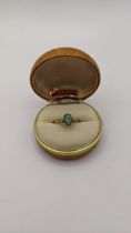 A 9ct gold ring set with an oval shaped opal, 1.9g Location: