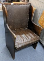 A circa 1900 oak lambing style chair having stud leather back upholstery Location: