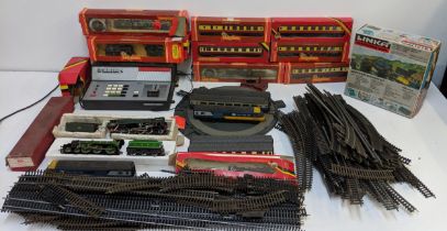 Hornby locomotives carriages and 00 gauge track, also to include a Zero ! Master control unite,