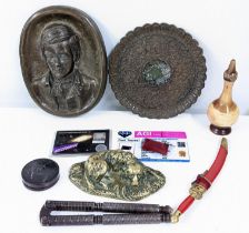 Collectables to include a bronze plaque, meteorite dust, a topaz, a seal, a metal model of a dog,