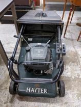 A Briggs and Stratton Hayter Harrier 56 Auto Drive petrol lawnmower with grass box Location: