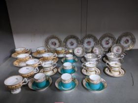 A selection of late 19th and early 20th century teacups and saucers and coffee cans, some retailed
