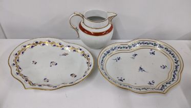 Two early 19th century Royal Crown Derby porcelain heart shaped dishes, painted with flowers and