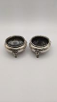 A pair of silver condiments hallmarked London 1914, 177.9g Location: