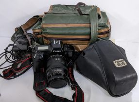 A Canon EOS 650 camera together with bag and accessories, and other items Location:
