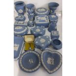 A collection of Wedgwood blue jasperware to include trinket boxes, miniature teapot heart shaped