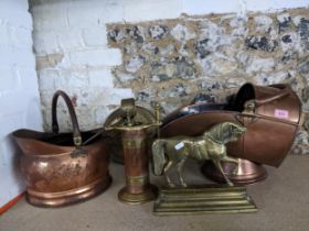 Metalware to include two copper helmet coal scuttles, a fire compendium set, and a horse mantel