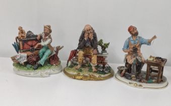 Three Capodimonte porcelain figures to include Cobbler/Shoemaker and two others, two signed to the