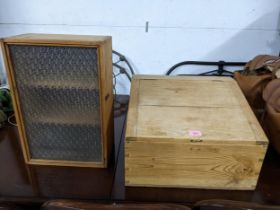 A pine desk top writing slope with hinged lid, a pine wall hanging cupboard with two internal