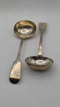 A pair of silver fiddle pattern sauce ladles by Elizabeth Eaton London 1847 129g Location: