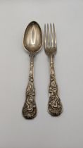 A pair of George IV Bacchanalian pattern silverware spoon and fork, 138g Location: