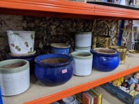 A group of garden pottery planters, a brass coal bucket, and similar planter, and brass scales