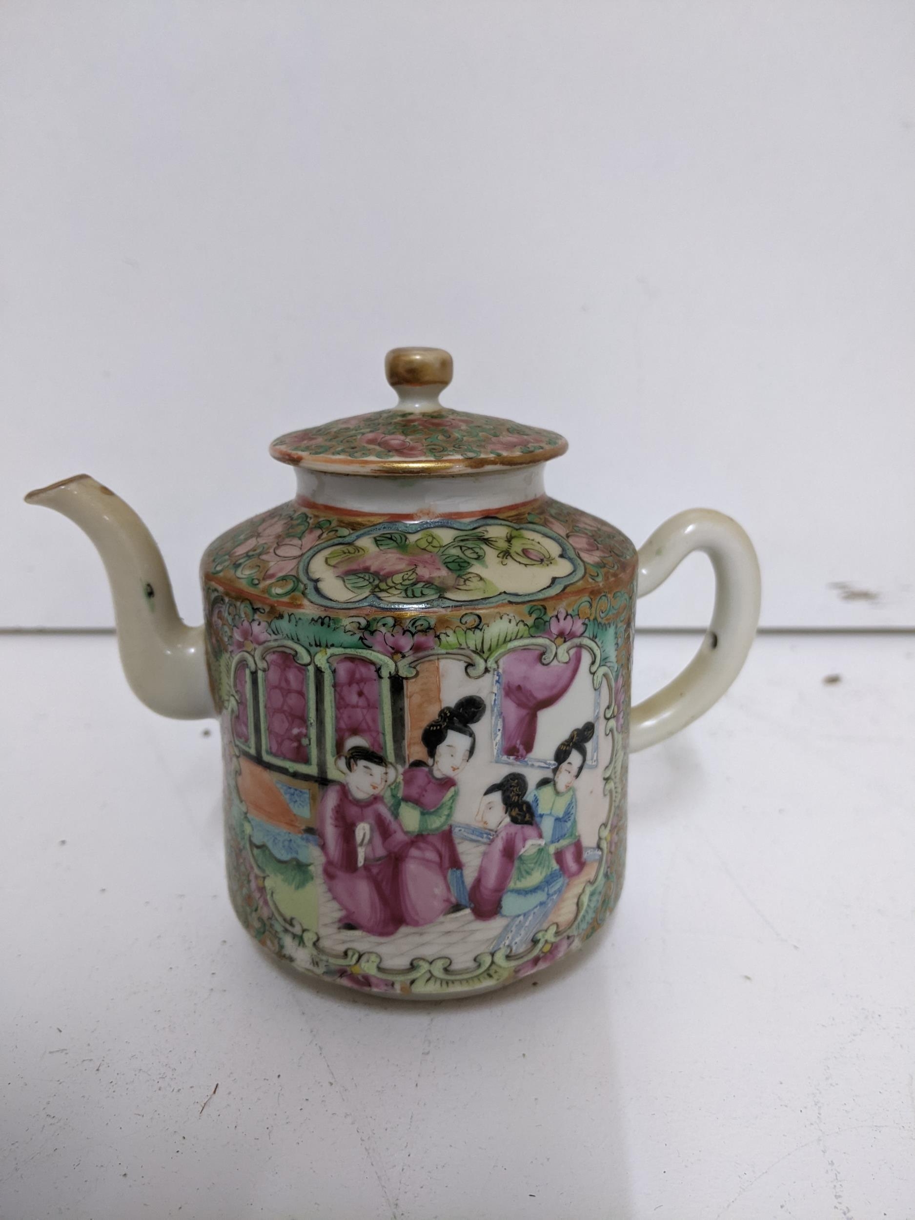 A Chinese Canton famille rose teapot and lid of small proportions, circa 1900 Location: