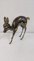 A gilt metal doe fawn sculpture, 31cm high Location: