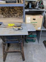 Tools to include a boxed Hitachi 255mm 10" compound saw, a table saw, Draper band saw 250,