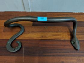 An early 20th century bronze door handle fashioned as a snake, Location: