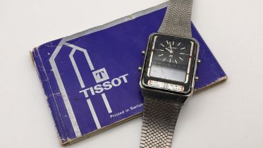 A vintage Tissot F1 digital analogue gents stainless steel wristwatch, calibre 2045 with instruction